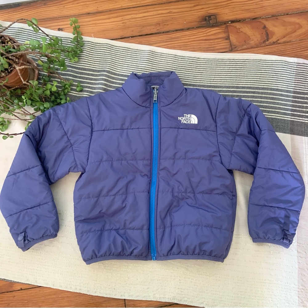 The North Face Kids Purple Puffer Jacket with Blue Zipper